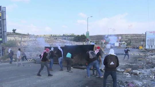 US changes policy toward Israeli settlements, ramps up pressure on Iran