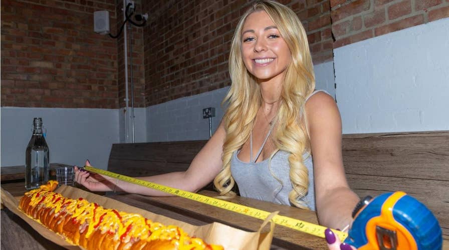 Food blogger finishes 3-foot hot dog thought to be biggest in UK