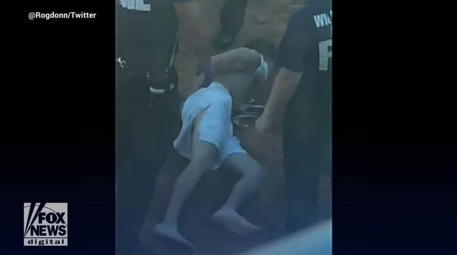 Teen suspect at Will Rogers Airport runs across tarmac, jumps off terminal roof to avoid arrest