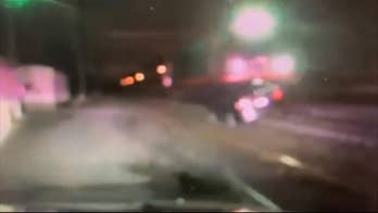 Police dashcam shows moment Amtrak train slams into car on New Jersey tracks