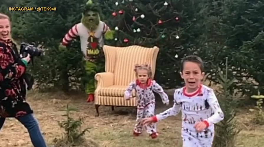 Hilarious video: Grinch scares children taking Christmas photos