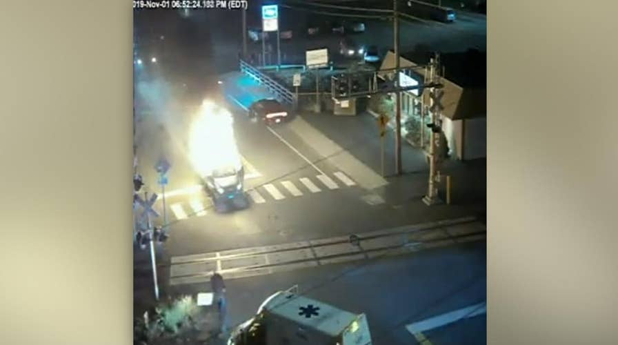 Hero saves man from burning car in Connecticut