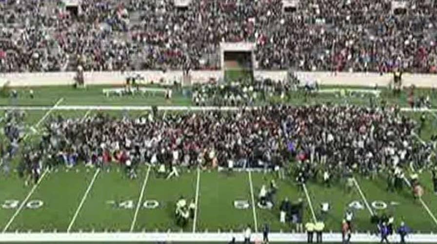 Harvard-Yale football game delayed after climate activists storm field