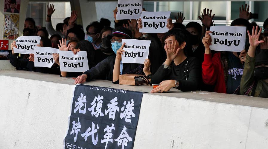 Trump signs legislation supporting anti-government protesters in Hong Kong