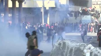 Iraqi prime minister signals his resignation after months of deadly protests