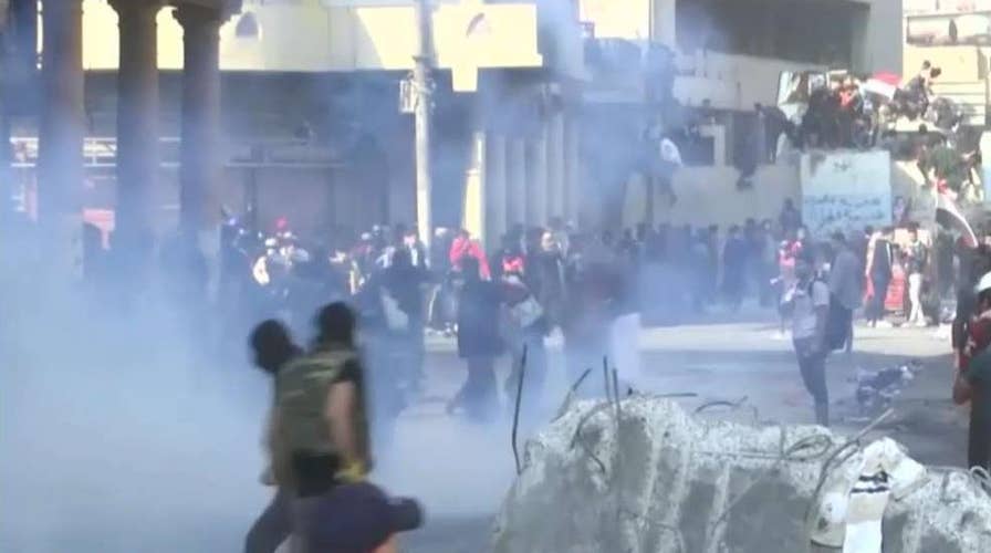 Iraqi prime minister signals his resignation after months of deadly protests