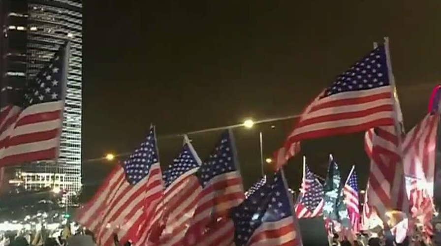 Hong Kong protesters praise Trump, wave American flags