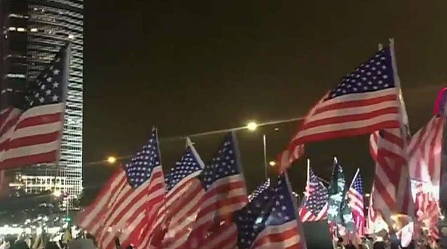 Hong Kong protesters praise Trump, wave American flags