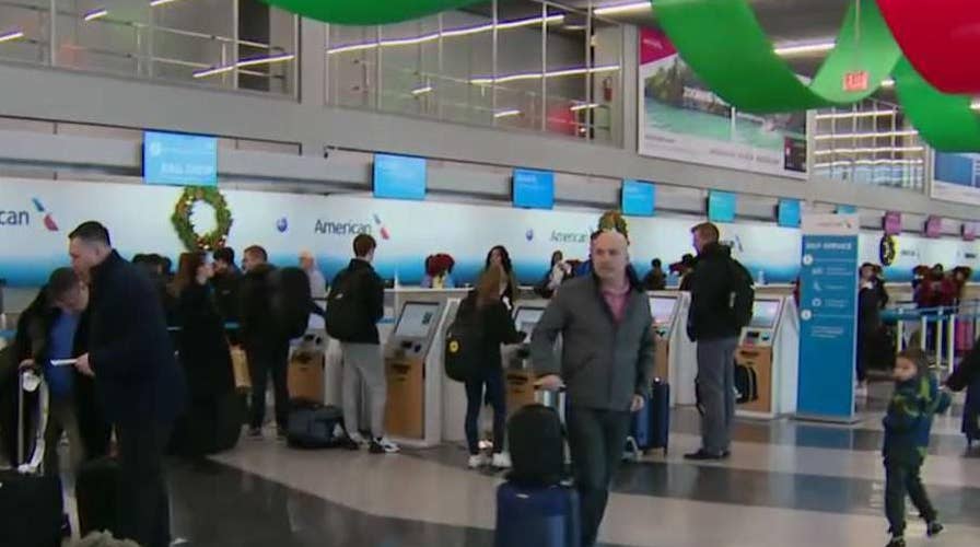 Millions of Americans under winter weather alert on one of the busiest travel days of the year