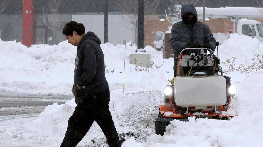 Major winter storm slams Northeast, grounds hundreds of flights
