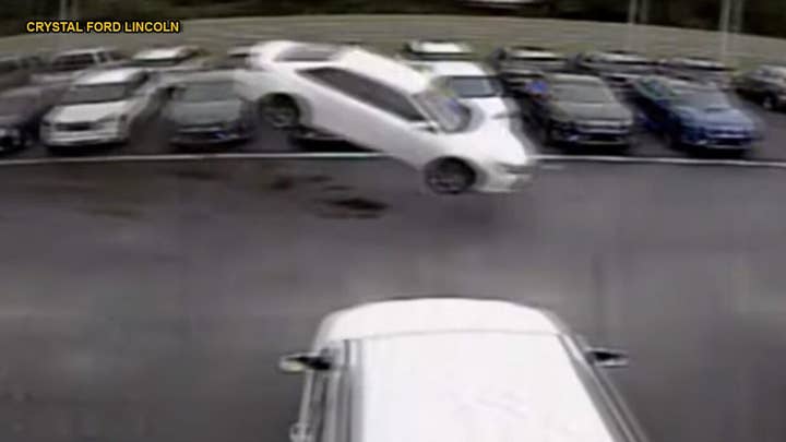 Watch: Toyota Camry launches 139 feet into the air, over two rows of vehicles before landing in parking lot