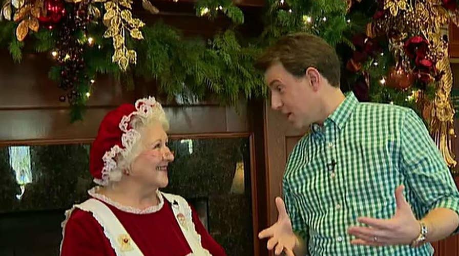 Todd and Mrs. Claus tour a Christmas Inn