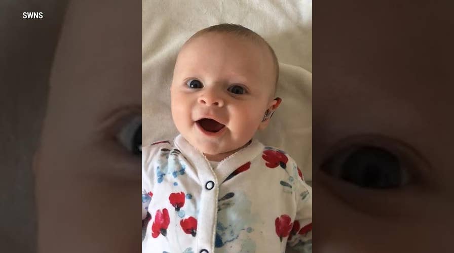 Caught on Video: Deaf baby hears mom's voice after hearing aids are switched on