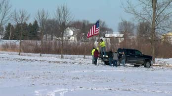 American flag raised near Minnesota National Guard helicopter crash as soldiers identified