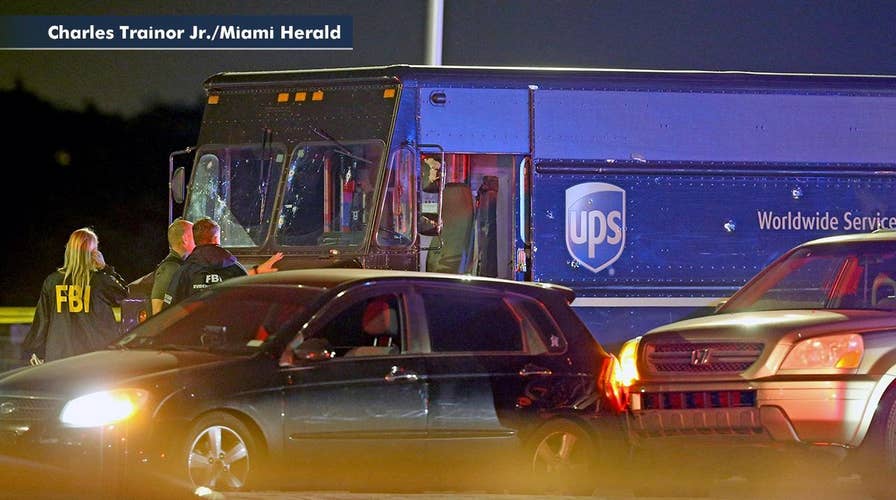 Police conduct questioned after two civilians killed in shootout with UPS truck hijackers