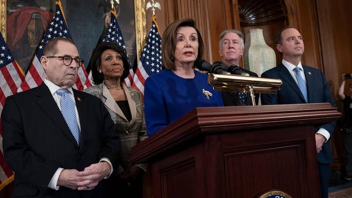 House Democrats unveil impeachment articles, alleging abuse of power and obstruction of Congress