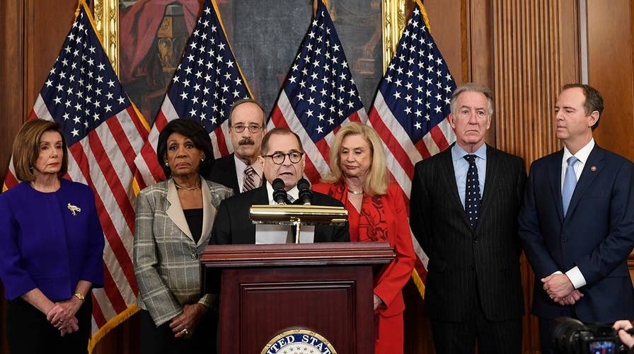 House Democrats announce two articles of impeachment against President Trump