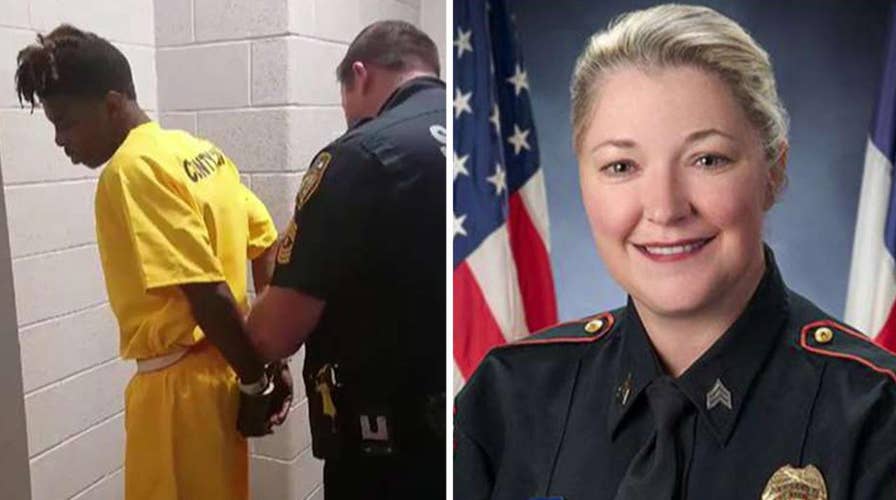 Fugitive accused of killing Texas police officer taken into custody