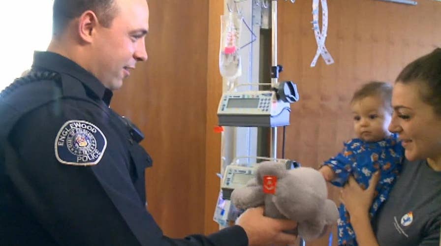 300 officers deliver presents to children's hospitals
