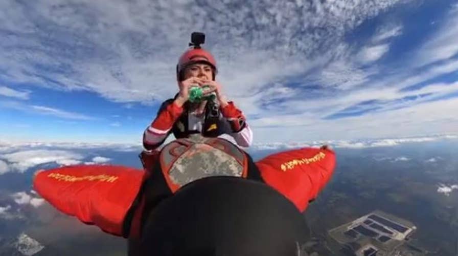 WATCH: Skydiver pulls out burger while skydiving