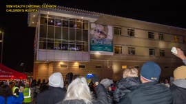 Hundreds 'Light Up Glennon' outside children's hospital to celebrate holiday season