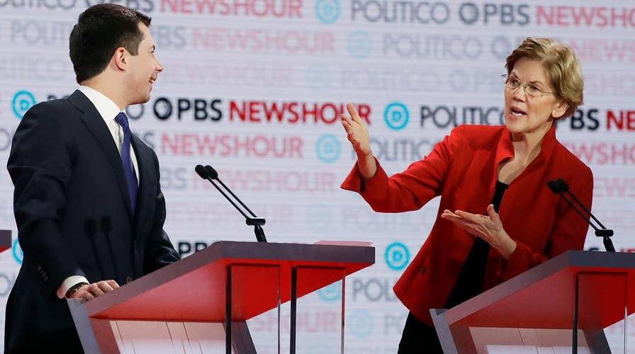 Democratic presidential candidates spar, face impeachment questions on debate stage