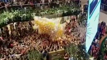 Balloon drop causes dangerous stampede in Sydney mall