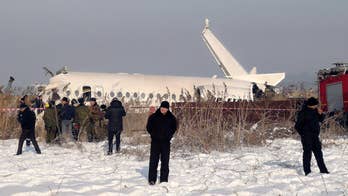 Plane carrying nearly 100 passengers goes down seconds after takeoff in Kazakhstan