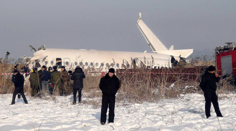 Plane carrying nearly 100 passengers goes down seconds after takeoff in Kazakhstan