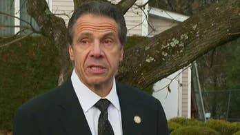 New York Gov. Cuomo helps rescue trapped motorist from wreck
