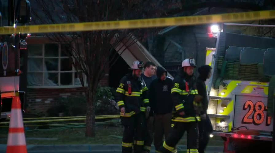 Raw video: First responders cordon off Maryland home that was struck by small plane