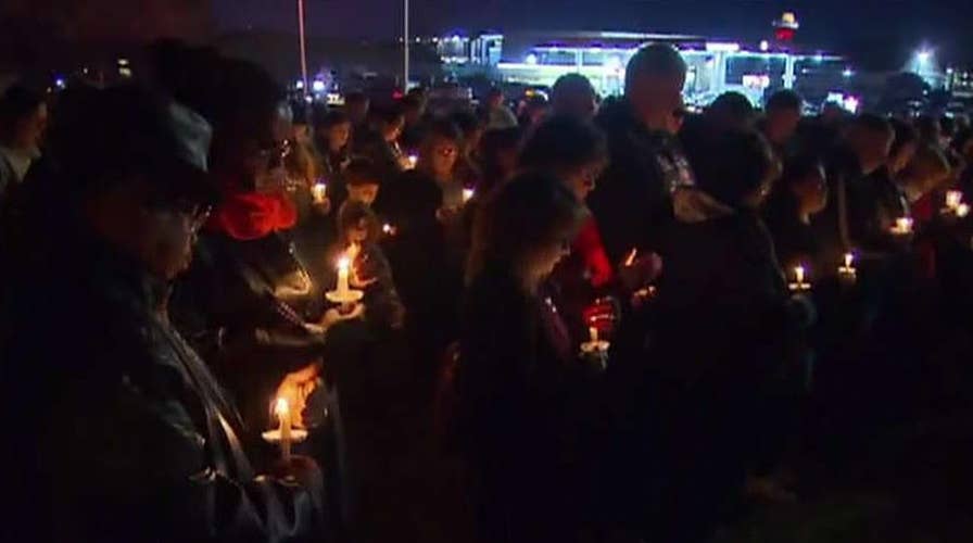 Texas church shooting: Dozens gather for candlelight vigil for victims