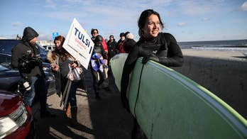 Tulsi Gabbard surfs in frigid New Hampshire waters to ring in new year