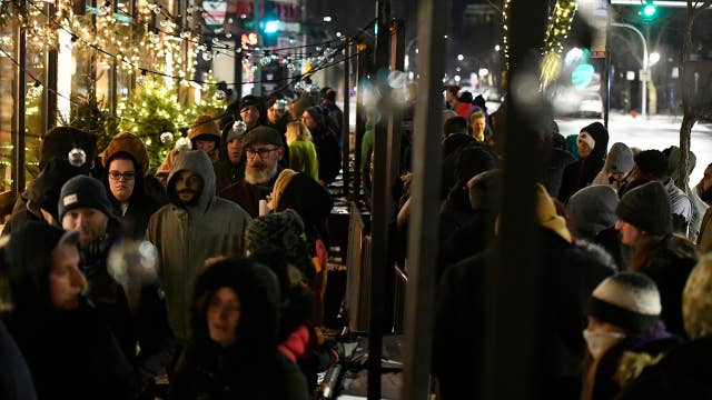 Thousands line up to buy marijuana as Illinois becomes 11th state to legalize pot