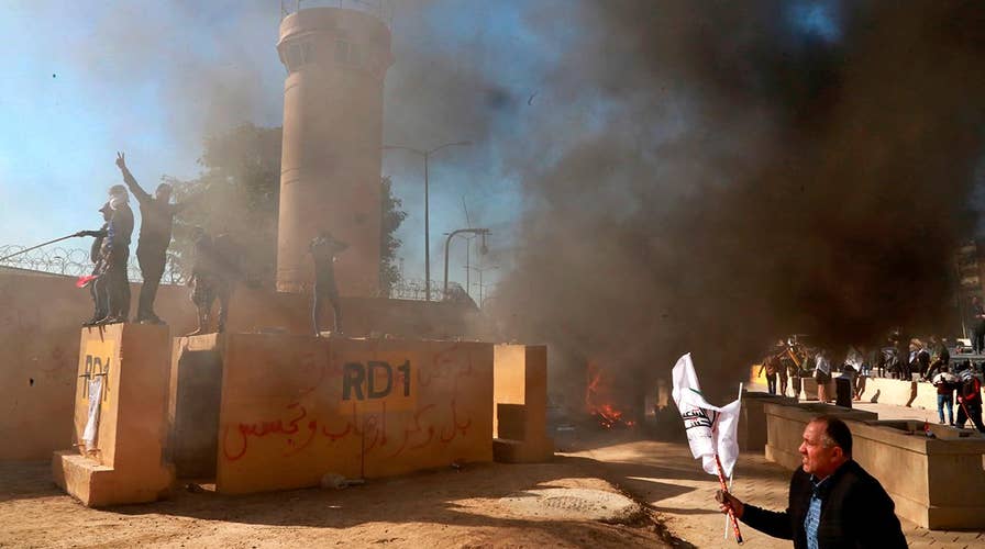 US soldiers head overseas in wake of violent attack on US embassy in Baghdad