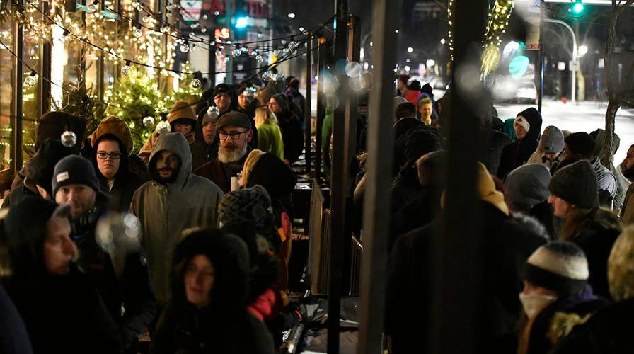 Thousands line up to buy marijuana as Illinois becomes 11th state to legalize pot