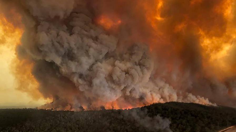 Wildfires force thousands of Australians to evacuate their homes