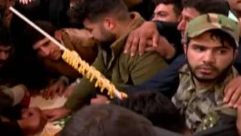 Mourners chant ‘death to America’ promising retaliation amid Soleimani’s death