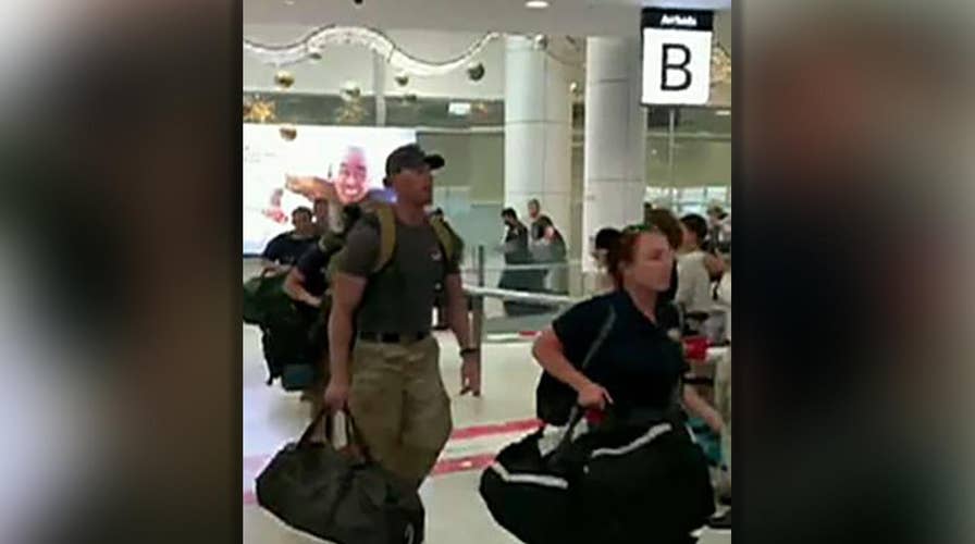 US firefighters cheered when arriving in Sydney