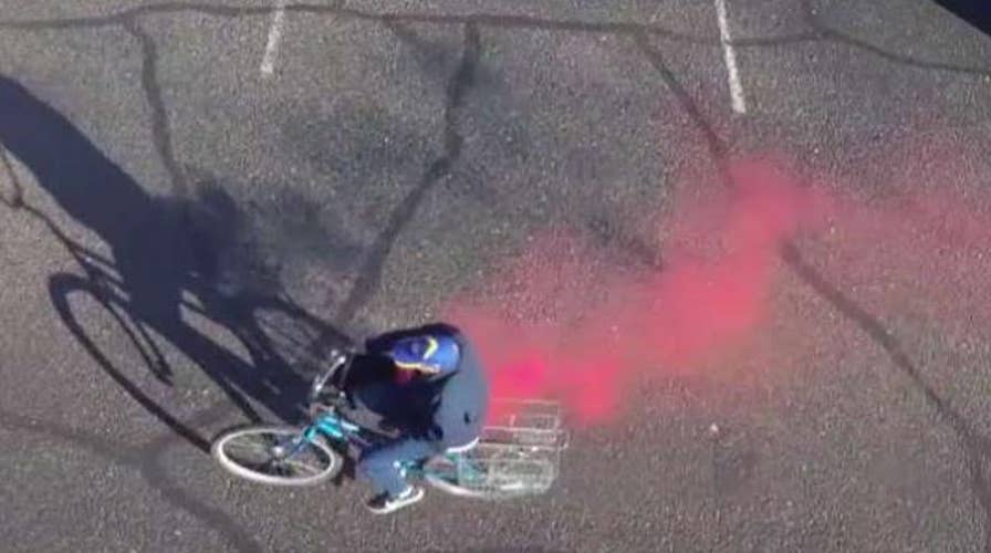 Dye pack explodes on bicycle bank robber