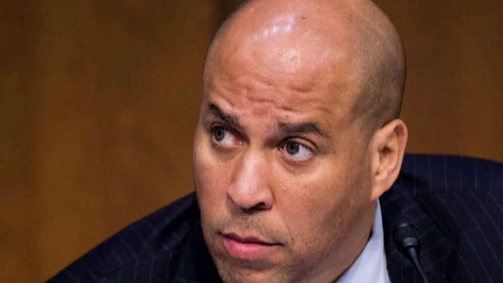 Cory Booker ends campaign for president as Biden, Sanders surge in Iowa