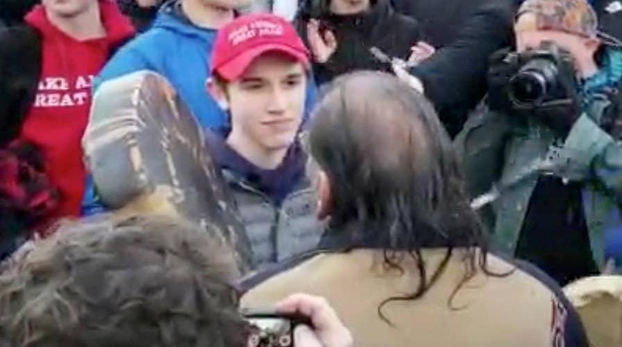 CNN settles student's suit