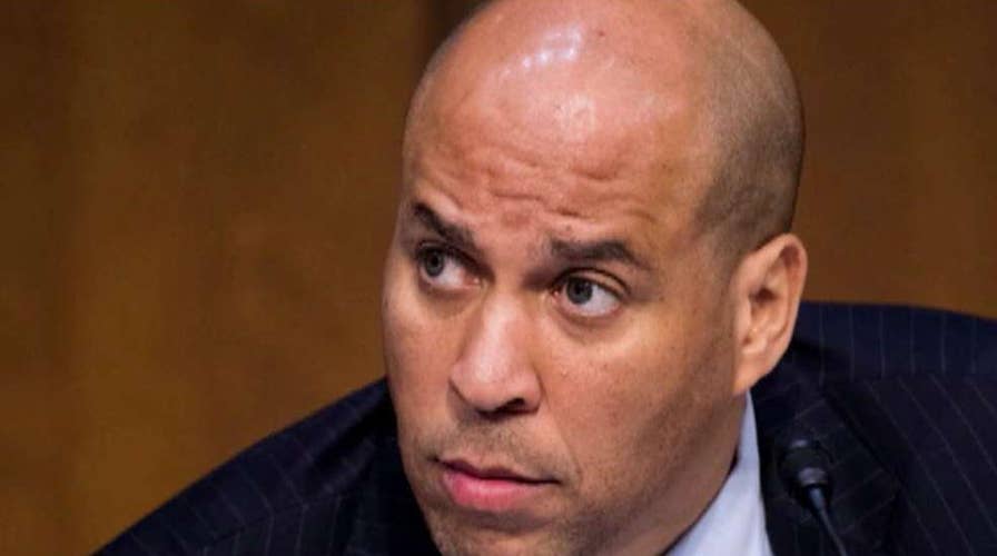 Cory Booker ends campaign for president as Biden, Sanders surge in Iowa