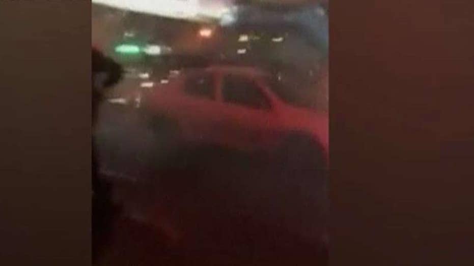 Iranian riot police fire tear gas at protesters despite Trump's warning