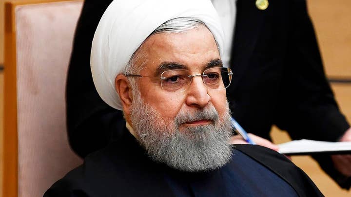 EU powers launch action under nuclear deal as Iran announces arrests in downing of Ukraine plane