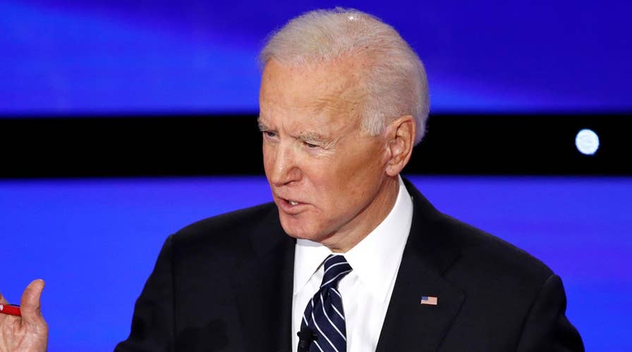 Biden touts record on climate change, Middle East