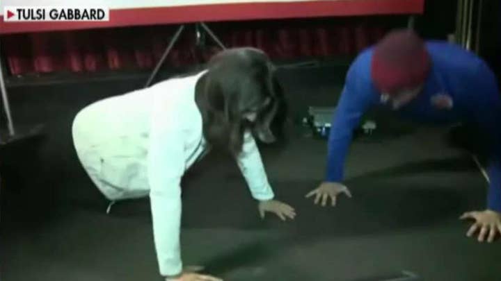Tulsi Gabbard challenged to push-up contest during New Hampshire town hall