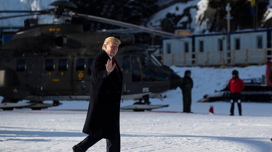 Trump attends World Economic Forum as impeachment trial kicks off