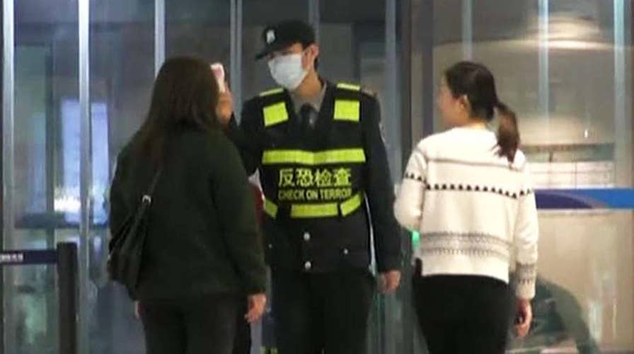 China confirms deadly coronavirus can pass person-to-person as nearly 300 cases are reported