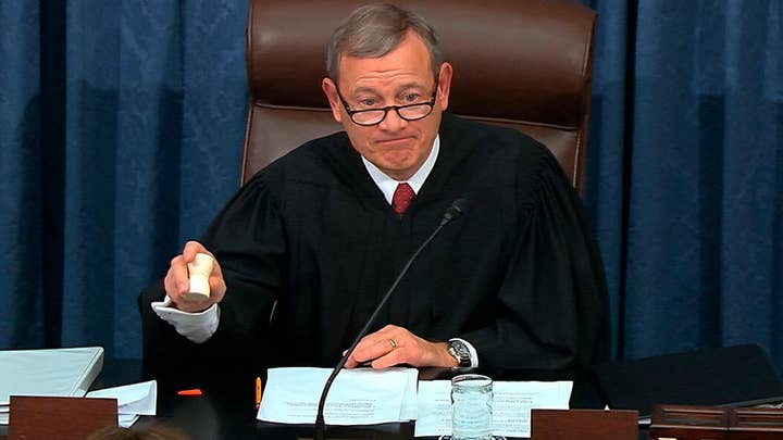 Chief Justice Roberts admonishes both sides at Senate impeachment trial